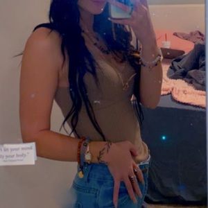 Cream body suit